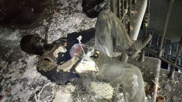 A  corpse of a man who died in 2 May 2014 in the Trade Unions House. - Sputnik International
