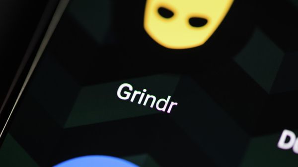Grindr app icon on smartphone screen - Sputnik International