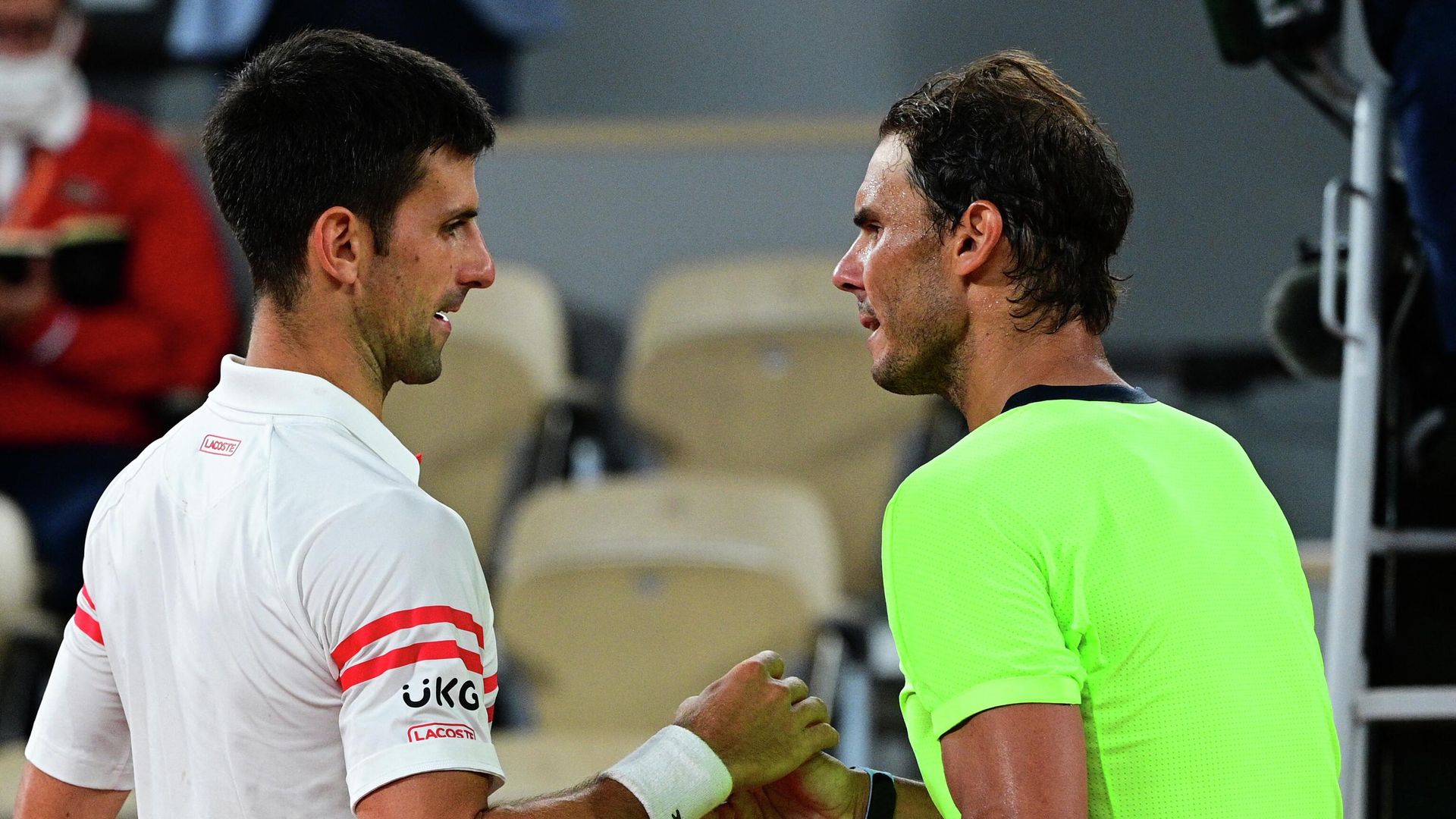 Serbia's Novak Djokovic (L) and Spain's Rafael Nadal shake hands at the end of their men's singles semi-final tennis match on Day 13 of The Roland Garros 2021 French Open tennis tournament in Paris on June 11, 2021 Serbia's Novak Djokovic (L) and Spain's Rafael Nadal shake hands at the end of their men's singles semi-final tennis match on Day 13 of The Roland Garros 2021 French Open tennis tournament in Paris on June 11, 2021 - Sputnik International, 1920, 31.05.2022