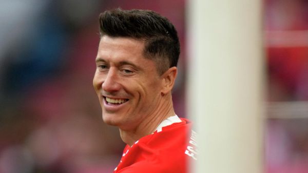 Bayern's Robert Lewandowski smiles during the German Bundesliga soccer match between Bayern Munich and Stuttgart, at the Allianz Arena, in Munich, Germany, Sunday, May 8, 2022 Bayern's Robert Lewandowski smiles during the German Bundesliga soccer match between Bayern Munich and Stuttgart, at the Allianz Arena, in Munich, Germany, Sunday, May 8, 2022 - Sputnik International