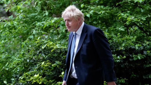 Britain's Prime Minister Boris Johnson walks down Downing Street after a press conference in London, Wednesday, May 25, 2022 - Sputnik International