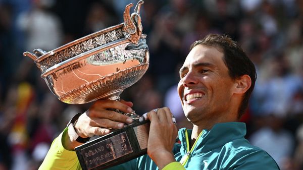 Spain's Rafael Nadal poses with The Musketeers' Cup as he celebrates after victory over Norway's Casper Ruud during their men's singles final match on day fifteen of the Roland-Garros Open tennis tournament at the Court Philippe-Chatrier in Paris on June 5, 2022 - Sputnik International