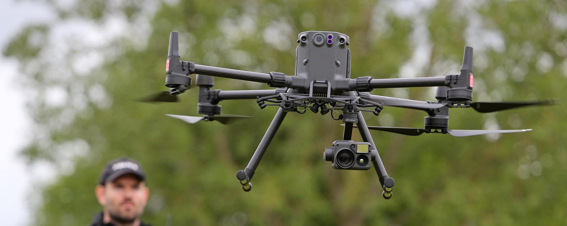Acting Police Sergeant Chris Linzey pilots a DJI Matrice M300 drone (UAV) during a demonstration for media ahead of the upcoming in-person G7 Summit to be held in Cornwall, at the Police headquarters in Exeter, southwest England on May 25, 2021. - Sputnik International, 1920, 04.07.2022