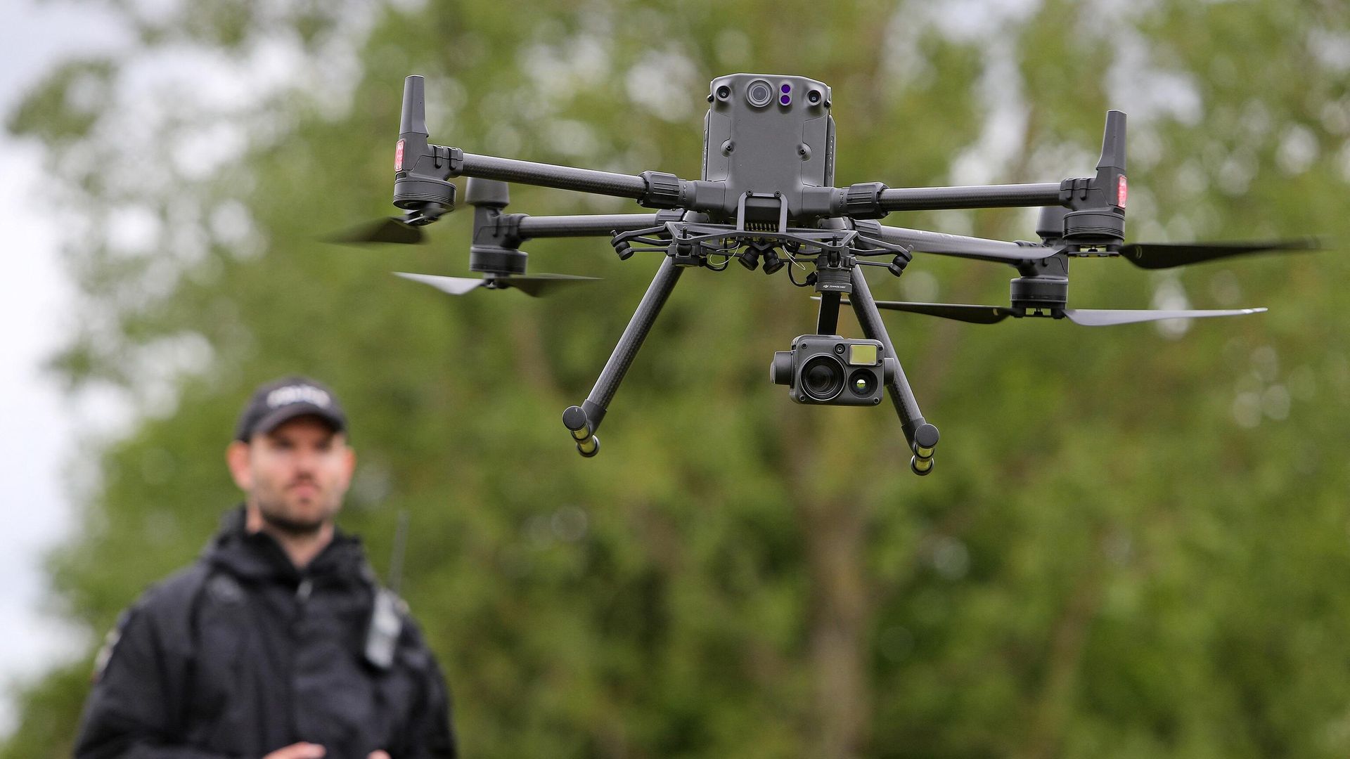 Acting Police Sergeant Chris Linzey pilots a DJI Matrice M300 drone (UAV) during a demonstration for media ahead of the upcoming in-person G7 Summit to be held in Cornwall, at the Police headquarters in Exeter, southwest England on May 25, 2021. - Sputnik International, 1920, 06.06.2022