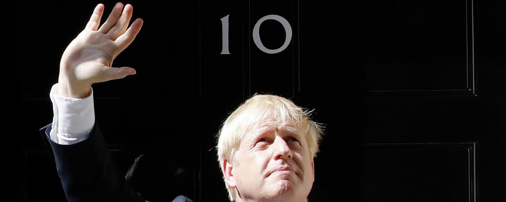 (FILES) In this file photo taken on July 24, 2019 Britain's new Prime Minister Boris Johnson gestures after giving a speech outside 10 Downing Street in London the day he was formally appointed British prime minister - Sputnik International, 1920, 23.06.2022