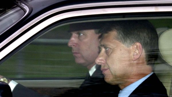 Prince Andrew at the wheel of his car next to a detective arrives at the Chapel Royal, Windsor Park, 31 March 2002 Prince Andrew at the wheel of his car next to a detective arrives at the Chapel Royal, Windsor Park, 31 March 2002 - Sputnik International