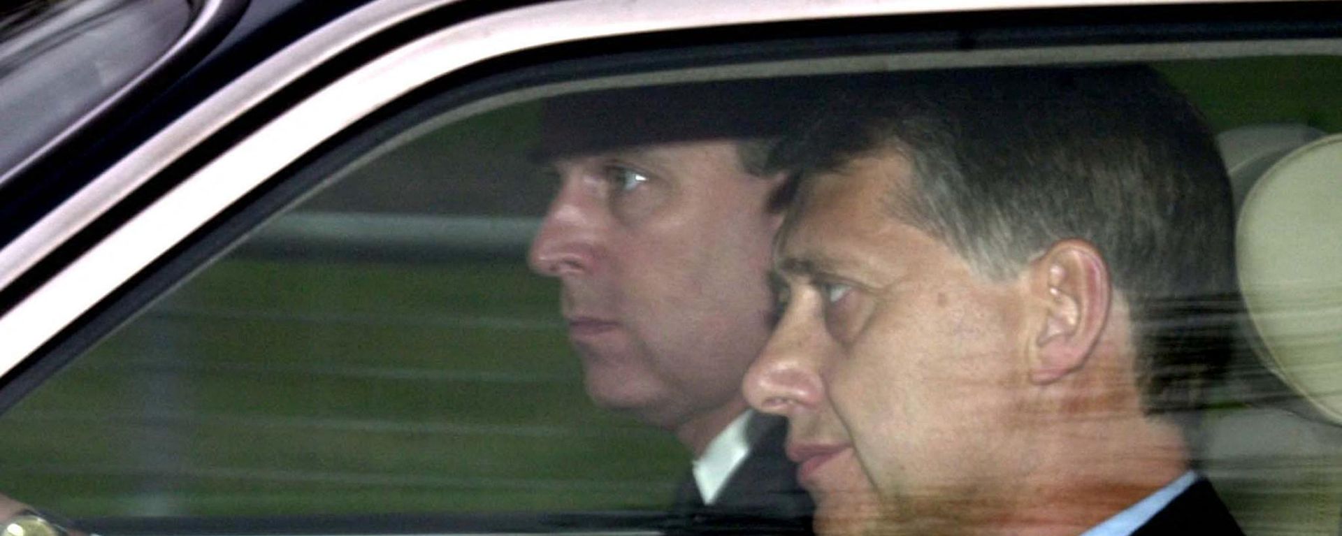 Prince Andrew at the wheel of his car next to a detective arrives at the Chapel Royal, Windsor Park, 31 March 2002 Prince Andrew at the wheel of his car next to a detective arrives at the Chapel Royal, Windsor Park, 31 March 2002 - Sputnik International, 1920, 10.06.2022