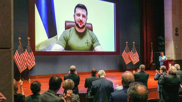 FILE - Members of Congress give Ukraine President Volodymyr Zelensky a standing ovation before he speaks in a virtual address to Congress in the U.S. Capitol Visitors Center Congressional Auditorium in Washington, on Wednesday, March 16, 2022 - Sputnik International