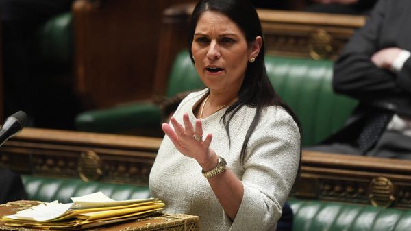 A handout photograph released by the UK Parliament shows Britain's Home Secretary Priti Patel gesturing as she gives a statement concerning the deal plan to send migrants and asylum seekers who cross the Channel to Rwanda, at the House of Commons, in London, on April 19, 2022 - Sputnik International