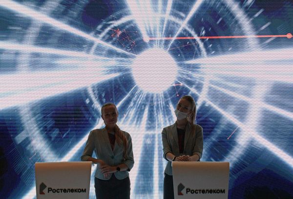 Girls at the Rostelecom stand at the XXV St. Petersburg International Economic Forum. - Sputnik International