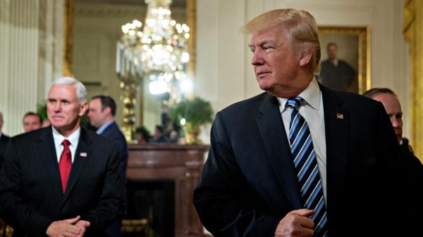 WASHINGTON, DC - JANUARY 22: U.S. President Donald Trump walks out with U.S. Vice President Mike Pence during a swearing in ceremony of White House senior staff in the East Room of the White House on January 22, 2017 in Washington, DC. - Sputnik International