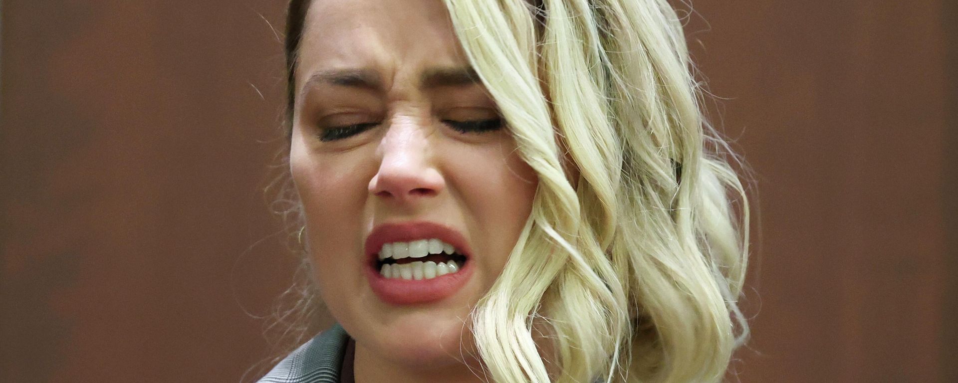 Actor Amber Heard testifies in the courtroom in the Fairfax County Circuit Courthouse in Fairfax, Va., Thursday, May 26, 2022.  - Sputnik International, 1920, 19.06.2022