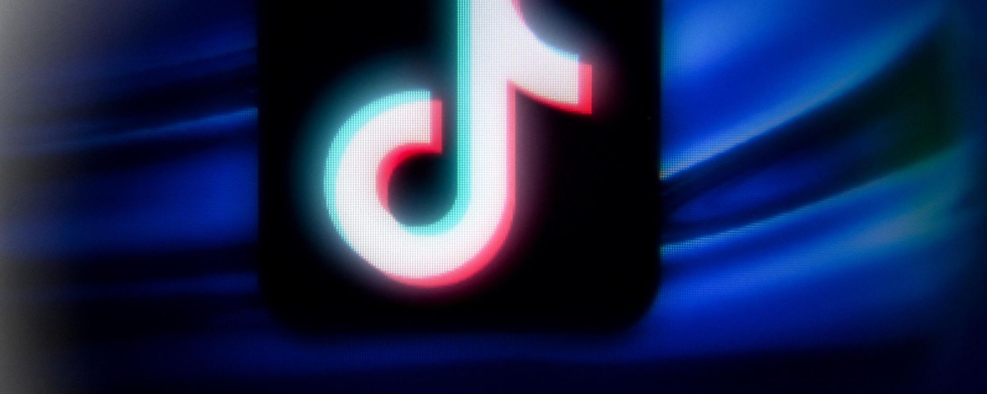 This picture taken in Moscow on November 11, 2021 shows the Chinese social networking service TikTok's logo on a tablet screen. - Sputnik International, 1920, 20.06.2022