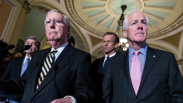Sen. Mitch McConnell, R-Ky., left, and Sen. John Cornyn, R-Texas, right, talk to reporters following a closed-door policy meeting at the Capitol in Washington, Tuesday, March 8, 2016. In the aftermath of recent horrific mass shootings in Uvalde, Texas and Buffalo, New York, a bipartisan group of senators, including Cornyn and Sen. Chris Murphy, D-Conn., are holding private virtual meetings during recess to try to strike a compromise over gun safety legislation.  - Sputnik International