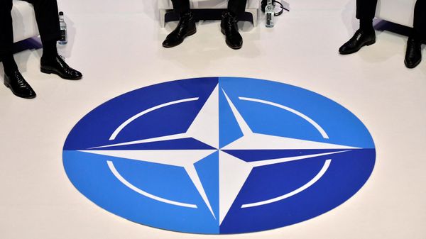 The Nato logo is pictured during a panel discussion at an official NATO outreach event, 'Nato Engages' in central London on December 3, 2019, prior to the NATO alliance summit - Sputnik International