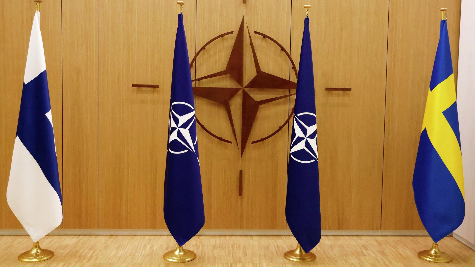 A photograph shows flags of Finland, NATO and Sweden during a ceremony during a ceremony to mark Sweden's and Finland's application for membership in Brussels, on May 18, 2022 A photograph shows flags of Finland, NATO and Sweden during a ceremony during a ceremony to mark Sweden's and Finland's application for membership in Brussels, on May 18, 2022 - Sputnik International, 1920, 29.06.2022