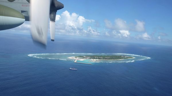 An aerial view shows a vessel preparing for a search-and-rescue exercise off Taiping island, in the South China Sea , Tuesday, Nov. 29, 2016, as part of efforts to cement its claim to a key island in the strategically vital waterbody - Sputnik International