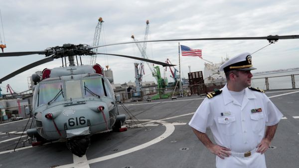 U.S. Navy Lt. Joe Keiley, from Boston, MA, stands on the flight deck of USS Blue Ridge as it docks at Tanjung Priok Port in Jakarta, Indonesia, Wednesday, May 1, 2019. - Sputnik International