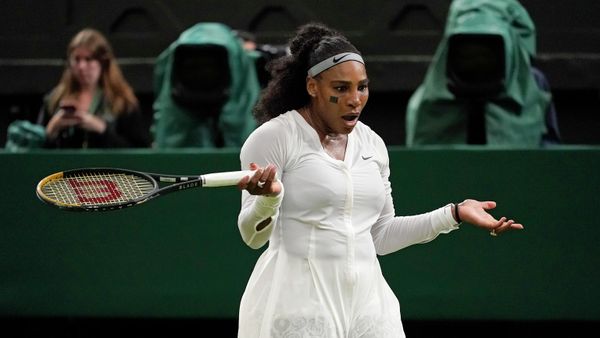 Serena Williams of the US reacts after losing a point as she plays France's Harmony Tan in a first round women's singles match on day two of the Wimbledon tennis championships in London, Tuesday, June 28, 2022 - Sputnik International