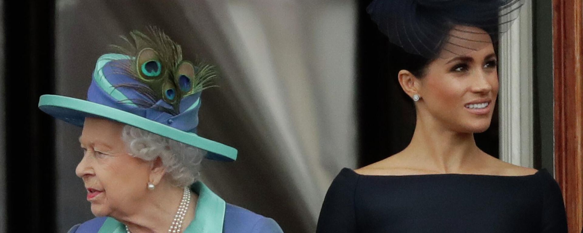 FILE - In this Tuesday, July 10, 2018 file photo Britain's Queen Elizabeth II and Meghan the Duchess of Sussex stand on a balcony to watch a flypast of Royal Air Force aircraft pass over Buckingham Palace in London. As part of a surprise announcement distancing themselves from the British royal family, Prince Harry and his wife Meghan declared they will work to become financially independent _ a move that has not been clearly spelled out and could be fraught with obstacles FILE - In this Tuesday, July 10, 2018 file photo Britain's Queen Elizabeth II and Meghan the Duchess of Sussex stand on a balcony to watch a flypast of Royal Air Force aircraft pass over Buckingham Palace in London. As part of a surprise announcement distancing themselves from the British royal family, Prince Harry and his wife Meghan declared they will work to become financially independent _ a move that has not been clearly spelled out and could be fraught with obstacles - Sputnik International, 1920, 04.09.2022