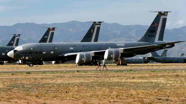 309th Aerospace Maintenance and Regeneration Group employees walk past Boeing KC-135R Stratotankers at the boneyard, Thursday, May 14, 2015 at Davis-Monthan Air Force Base in Tucson, Ariz. The boneyard is world’s largest aircraft storage and preservation facility. (AP Photo/Matt York) - Sputnik International