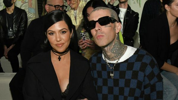 LOS ANGELES, CALIFORNIA - FEBRUARY 08: (L-R) Kourtney Kardashian and Travis Barker attend the AMIRI Autumn-Winter 2022 Runway Show on February 08, 2022 in Los Angeles, California.  - Sputnik International