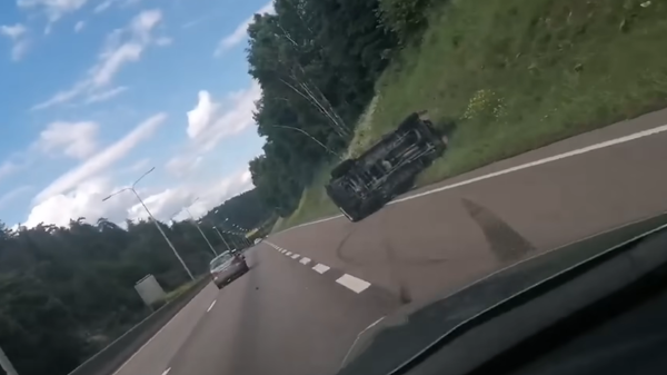A screenshot of a video depicting an SUV of Lars Thorsen from the Stop the Islamisation of Norway group getting rammed by a car. - Sputnik International
