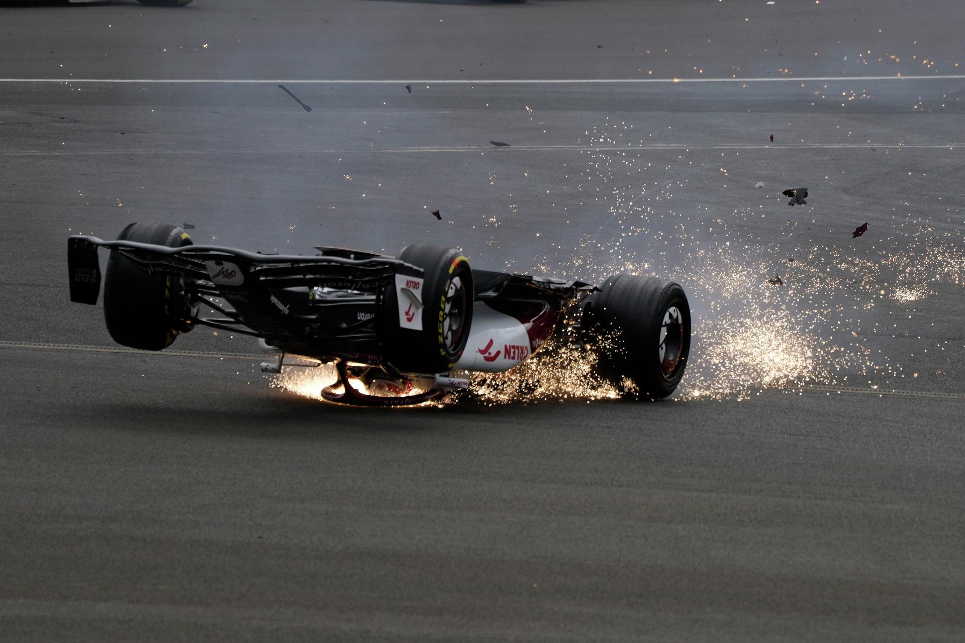 Alfa Romeo driver Guanyu Zhou of China crashes at the start of the British Formula One Grand Prix at the Silverstone circuit, in Silverstone, England, Sunday, July 3, 2022.  - Sputnik International, 1920, 03.07.2022