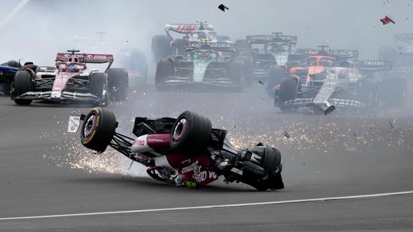 Alfa Romeo driver Guanyu Zhou of China crashes at the start of the British Formula One Grand Prix at the Silverstone circuit, in Silverstone, England, Sunday, July 3, 2022 - Sputnik International
