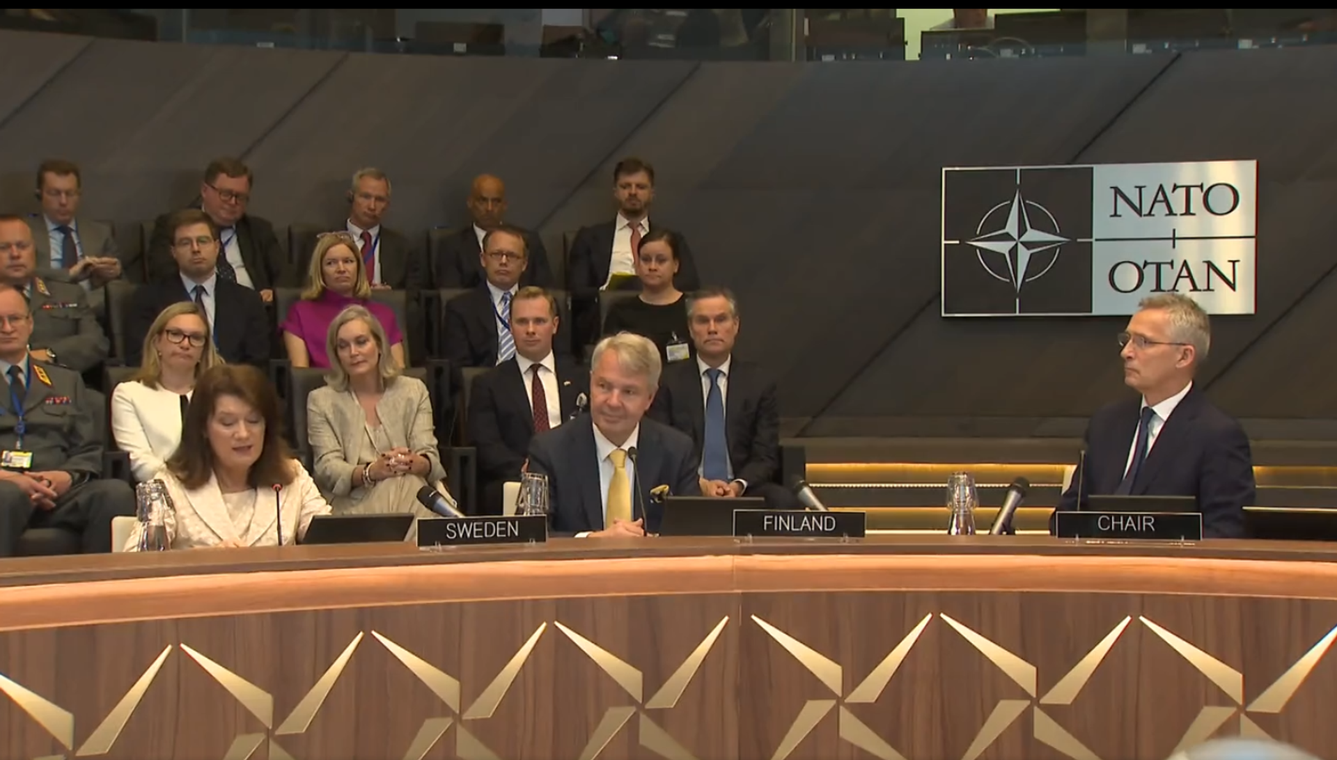 NATO Secretary General Jens Stoltenberg, the foreign ministers of Sweden and Finland, and ambassadors from NATO countries at signing ceremony on the signature of the accession protocols for the two Nordic nations. July 5, 2022. NATO Secretary General Jens Stoltenberg, the foreign ministers of Sweden and Finland, and ambassadors from NATO countries at signing ceremony on the signature of the accession protocols for the two Nordic nations. July 5, 2022. - Sputnik International, 1920, 17.03.2023