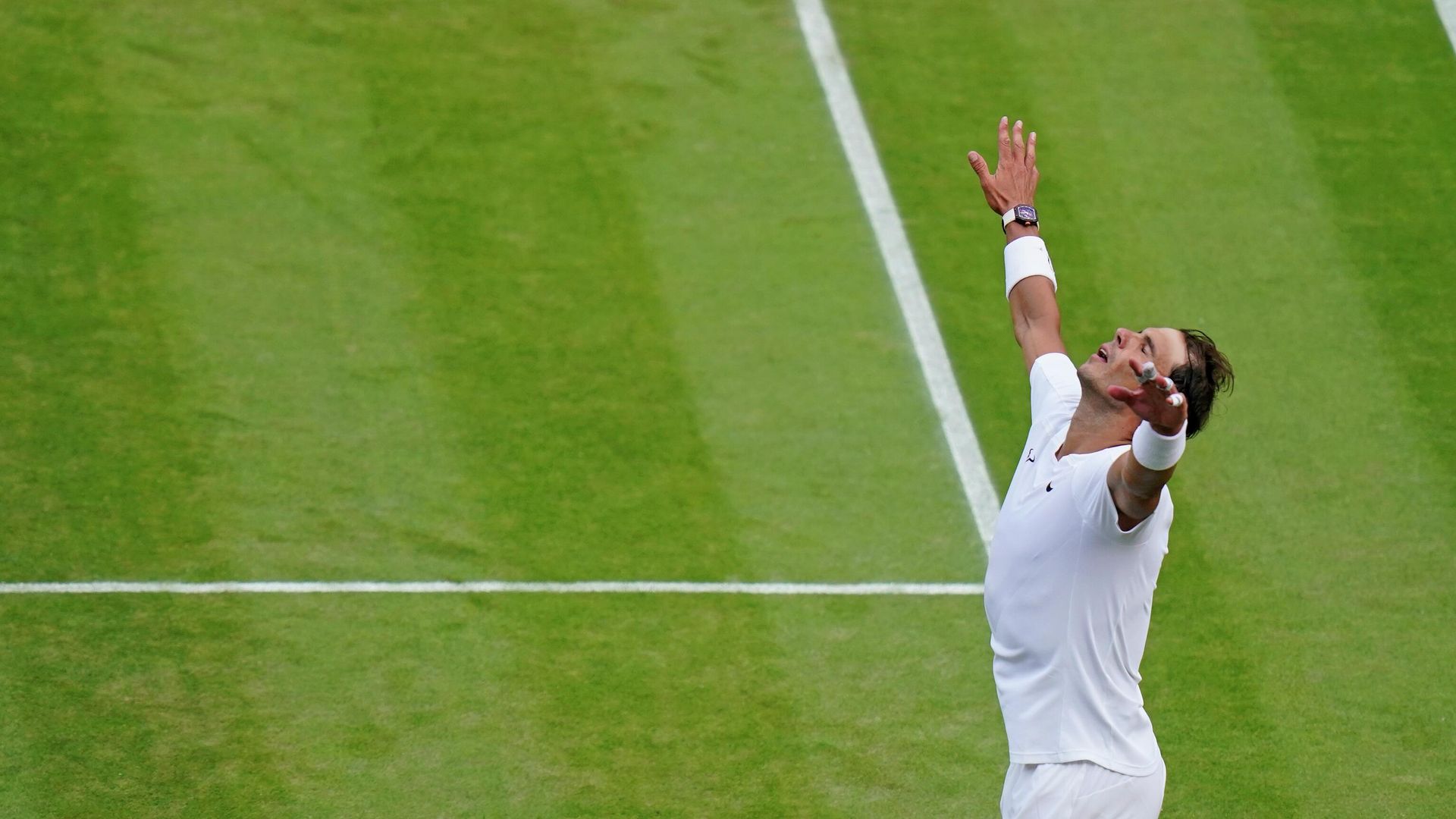 Spain's Rafael Nadal celebrates after beating Taylor Fritz of the US in a men's singles quarterfinal match on day ten of the Wimbledon tennis championships in London, Wednesday, July 6, 2022. - Sputnik International, 1920, 07.07.2022