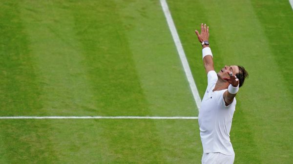 Spain's Rafael Nadal celebrates after beating Taylor Fritz of the US in a men's singles quarterfinal match on day ten of the Wimbledon tennis championships in London, Wednesday, July 6, 2022. - Sputnik International