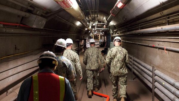 In this Dec. 23, 2021, photo provided by the U.S. Navy, Rear Adm. John Korka, Commander, Naval Facilities Engineering Systems Command (NAVFAC), and Chief of Civil Engineers, leads Navy and civilian water quality recovery experts through the tunnels of the Red Hill Bulk Fuel Storage Facility, near Pearl Harbor, Hawaii. A Navy investigation released Thursday, June 30, 2022 revealed that shoddy management and human error caused fuel to leak into Pearl Harbor's tap water last year, poisoning thousands of people and forcing military families to evacuate their homes for hotels. The investigation is the first detailed account of how jet fuel from the Red Hill Bulk Fuel Storage Facility, a massive World War II-era military-fun tank farm in the hills above Pearl Harbor, leaked into a well that supplied water to housing and offices in and around Pearl Harbor.  - Sputnik International