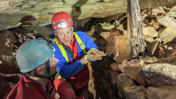 Ed Coghlan and Jamie Lund, right, inspect one of the timber props installed by the miners - Sputnik International