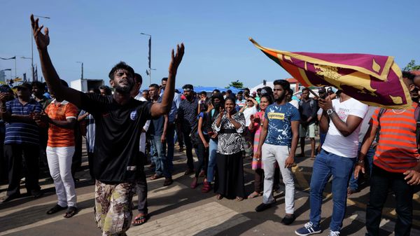 Protesters dance shouting slogans against president Gotabaya Rajapaksa outside his office in Colombo, Sri Lanka, Wednesday, July 13, 2022 - Sputnik International