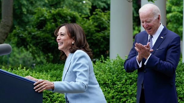 Vice President Kamala Harris steps up to the podium as President Joe Biden watches in the Rose Garden of the White House in Washington, Tuesday, May 17, 2022 - Sputnik International