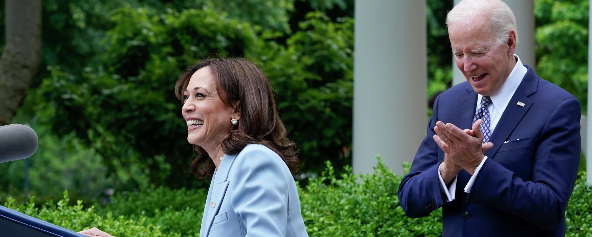 Vice President Kamala Harris steps up to the podium as President Joe Biden watches in the Rose Garden of the White House in Washington, Tuesday, May 17, 2022 - Sputnik International, 1920, 24.07.2024