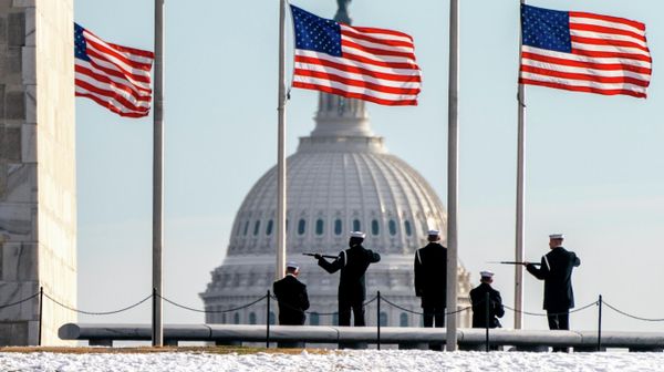 A year after the attack on the U.S. Capitol, Thursday, Jan. 6, 2022, a U.S. Navy Ceremonial Guard poses with their rifles during a photo session with their official photographer, with the Capitol in the background, on the National Mall in Washington A year after the attack on the U.S. Capitol, Thursday, Jan. 6, 2022, a U.S. Navy Ceremonial Guard poses with their rifles during a photo session with their official photographer, with the Capitol in the background, on the National Mall in Washington - Sputnik International