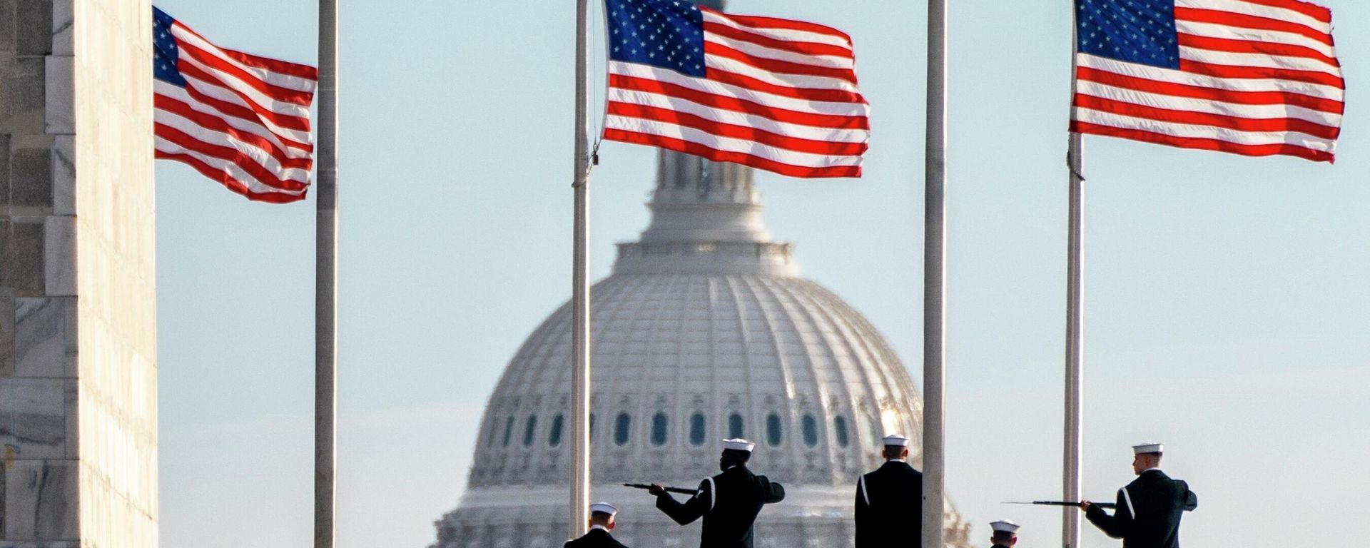 A year after the attack on the U.S. Capitol, Thursday, Jan. 6, 2022, a U.S. Navy Ceremonial Guard poses with their rifles during a photo session with their official photographer, with the Capitol in the background, on the National Mall in Washington - Sputnik International, 1920, 27.07.2022