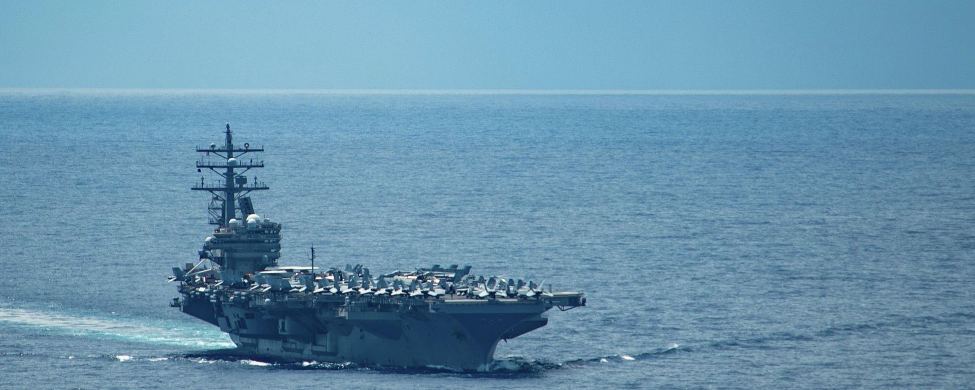 USS Ronald Reagan (CVN-76) transits the Balabec Strait USS Ronald Reagan (CVN-76) transits the Balabec Strait - Sputnik International, 1920, 13.10.2023