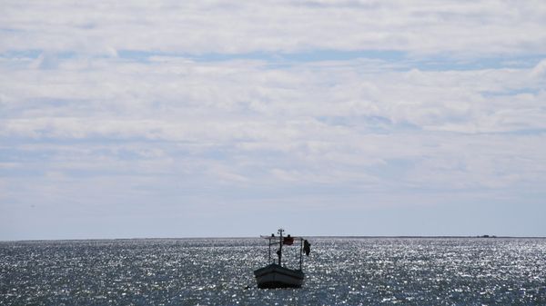 A boat on the shore of the Mediterranean Sea near the city of Lindos. - Sputnik International