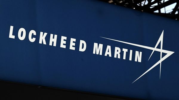 This photograph taken on June 13, 2022, shows the logo from US defence manufacturer Lockheed Martin on display at the Eurosatory international land and airland defence and security trade fair, in Villepinte, a northern suburb of Paris. (Photo by EMMANUEL DUNAND / AFP) - Sputnik International