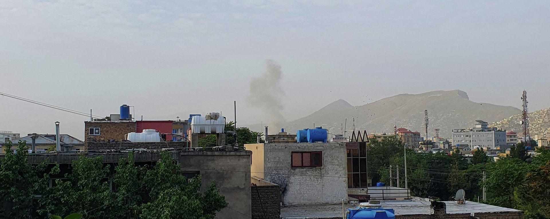 In this photograph taken on July 31, 2022, smoke rises from a house following a US drone strike in the Sherpur area of Kabul. - Sputnik International, 1920, 22.08.2022