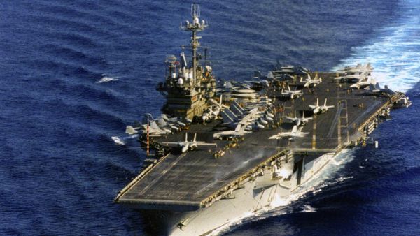 A port bow view showing the Aircraft Carrier USS INDEPENDENCE (CV 62) underway as a US Navy (USN) F-14 Tomcat aircraft from Carrier Air Wing Five (CVW-5), launches from the flight deck. March 10, 1996. - Sputnik International
