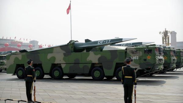 FILE - Chinese military vehicles carrying DF-17 ballistic missiles roll during a parade to commemorate the 70th anniversary of the founding of Communist China in Beijing, on Oct. 1, 2019 - Sputnik International