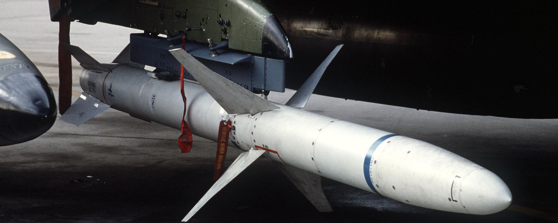 A view of an AGM-88 HARM high-speed anti-radiation missile mounted beneath the wing of a 37th Tactical Fighter Wing F-4G Phantom II Wild Weasel aircraft. - Sputnik International, 1920, 17.02.2023