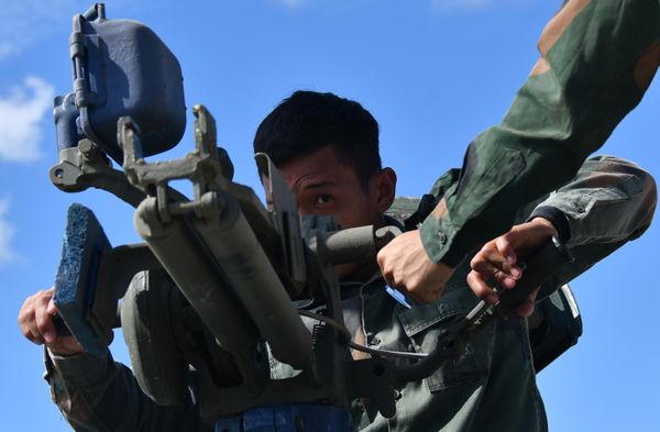 Military personnel of the Laos team during the firing of T-72B3 tank rounds at the Alabino military training ground in the Moscow region.  - Sputnik International