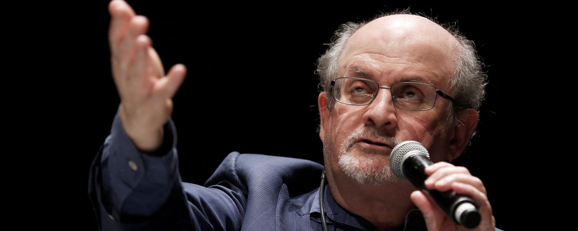 In this file photo taken on September 13, 2016, British writer Salman Rushdie speaks during the opening day of the Positive Economy Forum in Le Havre, northwestern France on September 13, 2016. - It has been reported that Rushdie was attacked on stage today during an event in New York. (Photo by CHARLY TRIBALLEAU / AFP) In this file photo taken on September 13, 2016, British writer Salman Rushdie speaks during the opening day of the Positive Economy Forum in Le Havre, northwestern France on September 13, 2016. - It has been reported that Rushdie was attacked on stage today during an event in New York. (Photo by CHARLY TRIBALLEAU / AFP) - Sputnik International, 1920, 12.08.2022