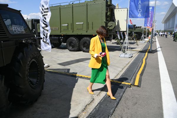 A visitor at an exhibition during the Army-2022 International Military-Technical Forum at the Patriot Congress and Exhibition Center. - Sputnik International