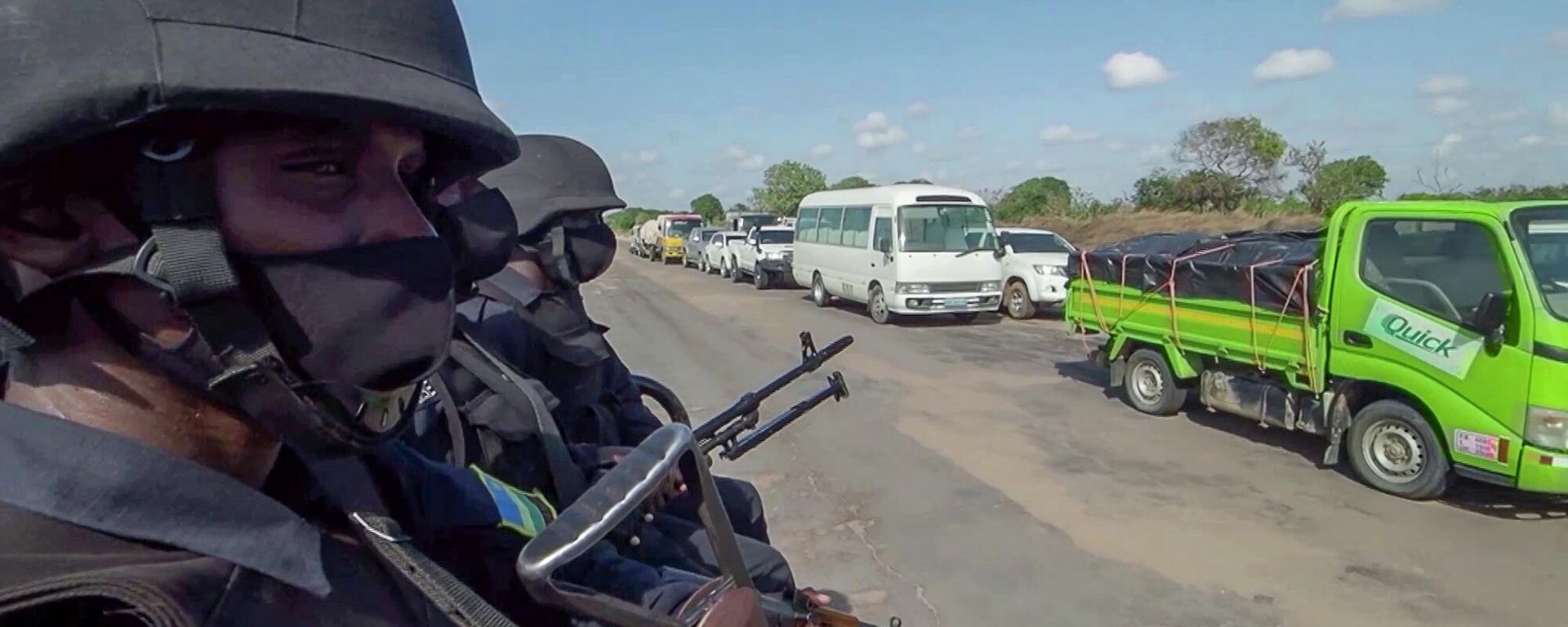 In this image made from video, Rwandan police patrol a road in Palma, Cabo Delgado province, Mozambique Sunday, Aug. 15, 2021. Rwanda's troops have rapidly helped Mozambique's armed forces achieve victories against Islamic extremists, who have created a humanitarian emergency in northern Cabo Delgado province and surrounding areas. - Sputnik International, 1920, 17.08.2022